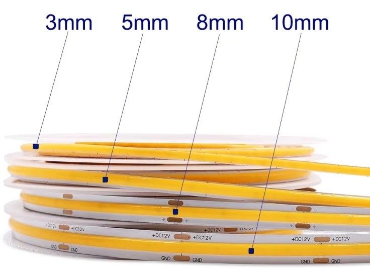 DC 12V 24V 5V Ultra Narrow 3mm Dotless COB LED Strip Light per illuminazione flessibile